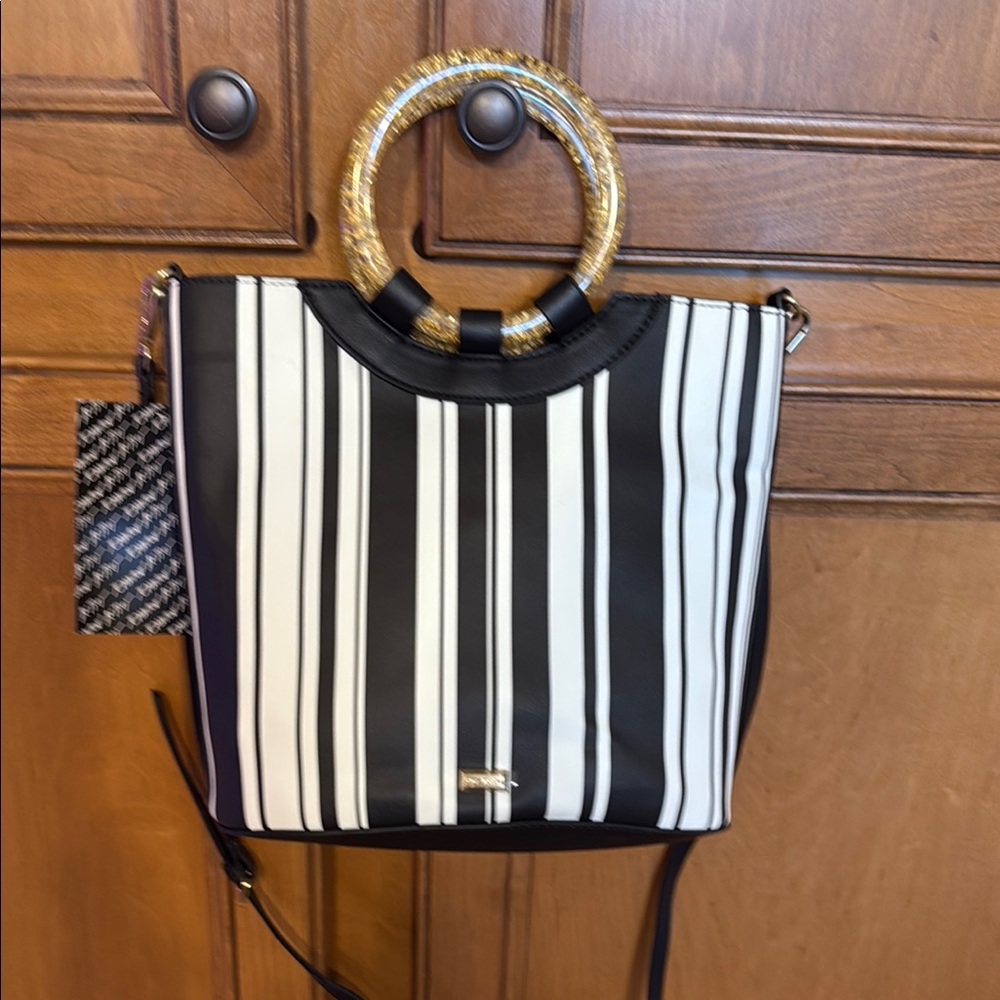 Elegant Black and White Striped Tote with Gold Accents